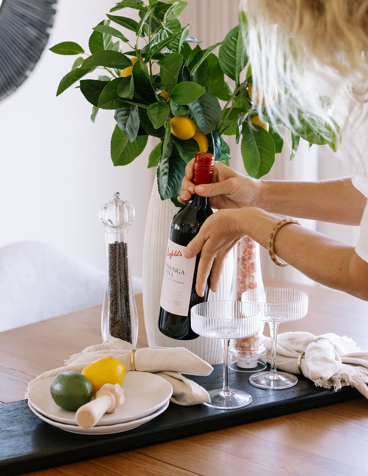 staging-dining-champagne-detail-newcastle.jpg Dining table styled with champagne and glassware detail in a staged home